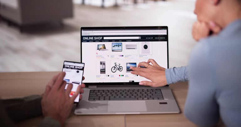 Couple Shopping Electronics Online In Ecommerce Shop